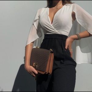 • White and black bodysuit